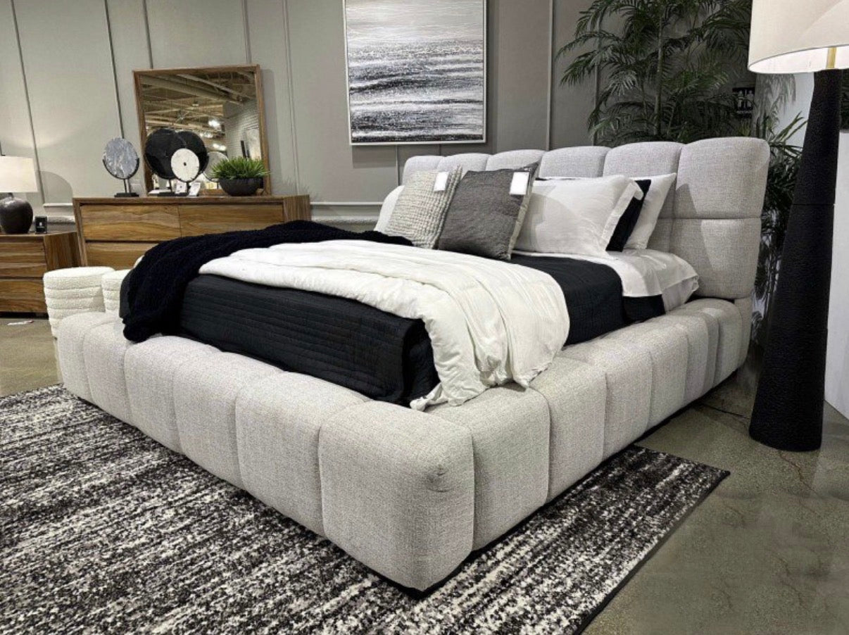 Grendusk Upholstered Bed — staged in room