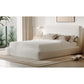 Mamu whitewashed chenille platform bed in a bedroom, angled view