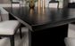 Juego de mesa de comedor Brookmead de 7 piezas con hojas extensibles, color negro
