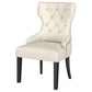 Silla de comedor Baney tapizada en tela beige y negra