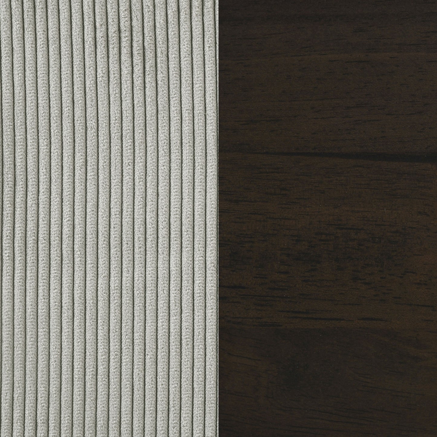 Sillón tapizado Deerhurst con brazos articulados y capitoné en color gris