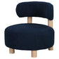 Silla decorativa Zonie Boucle con respaldo de barril tapizado en azul