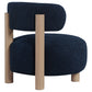 Silla decorativa Zonie Boucle con respaldo de barril tapizado en azul
