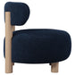 Silla decorativa Zonie Boucle con respaldo de barril tapizado en azul