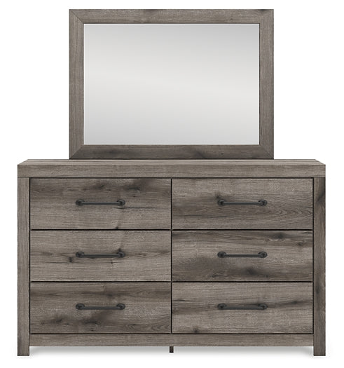 Graystorm Queen Panel Bed with Mirrored Dresser, Chest and Nightstand