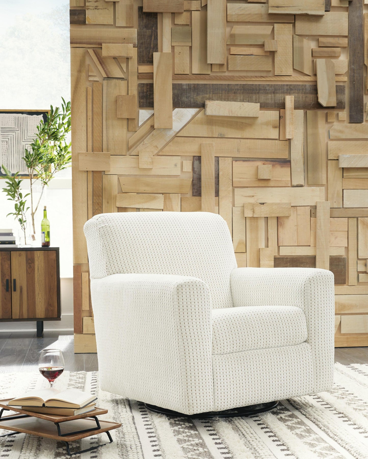 Sillón giratorio con acento deslizante Herstow
