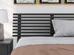 Cama con paneles de láminas Danziar