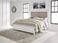 Cama Kanwyn Queen con paneles y tocador con espejo