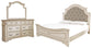 Cama tapizada Realyn King con paneles y tocador con espejo
