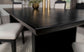 Mesa de comedor Brookmead de 100 pulgadas con hojas extensibles, color negro