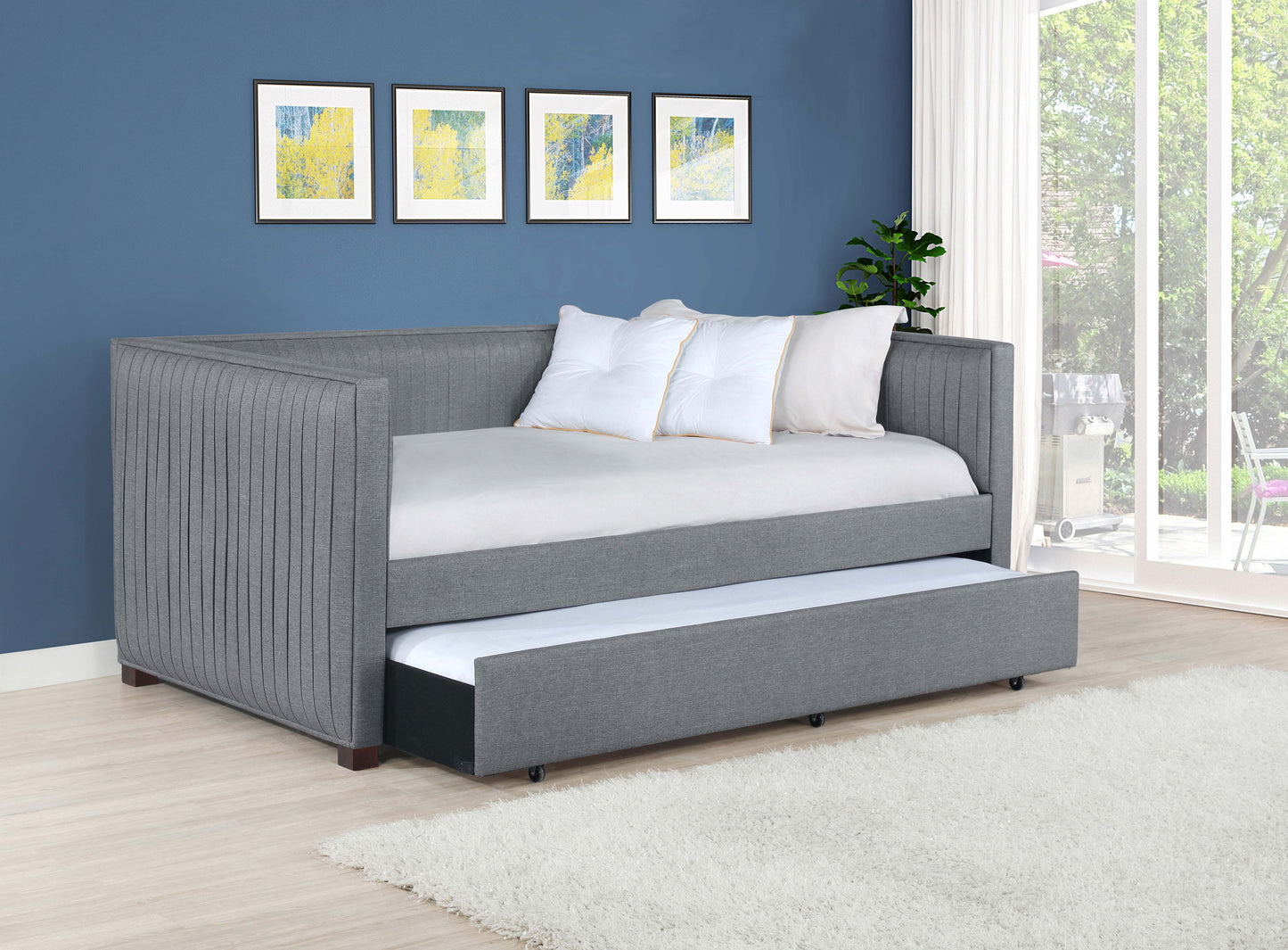 Sofá cama individual tapizado Brodie con cama nido en gris