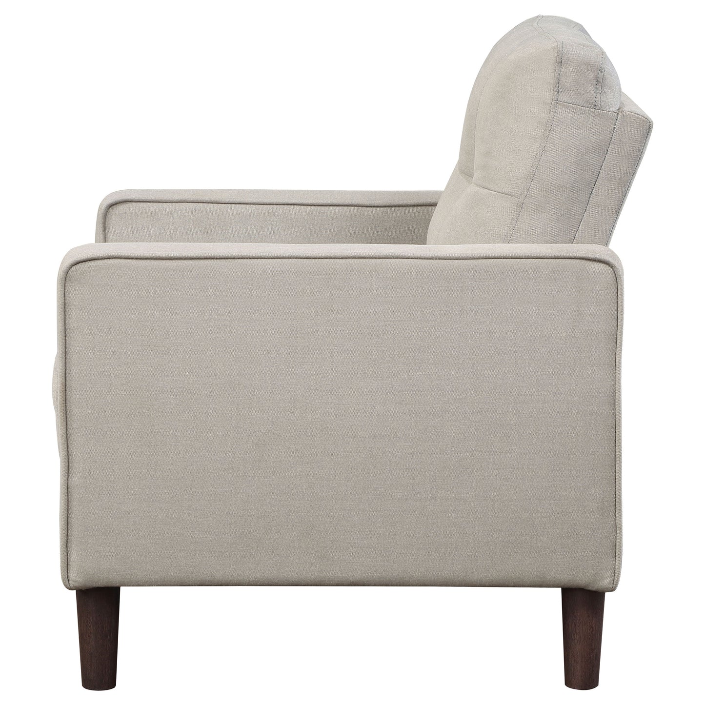 Sillón tapizado Bowen con brazos articulados y capitoné en color beige