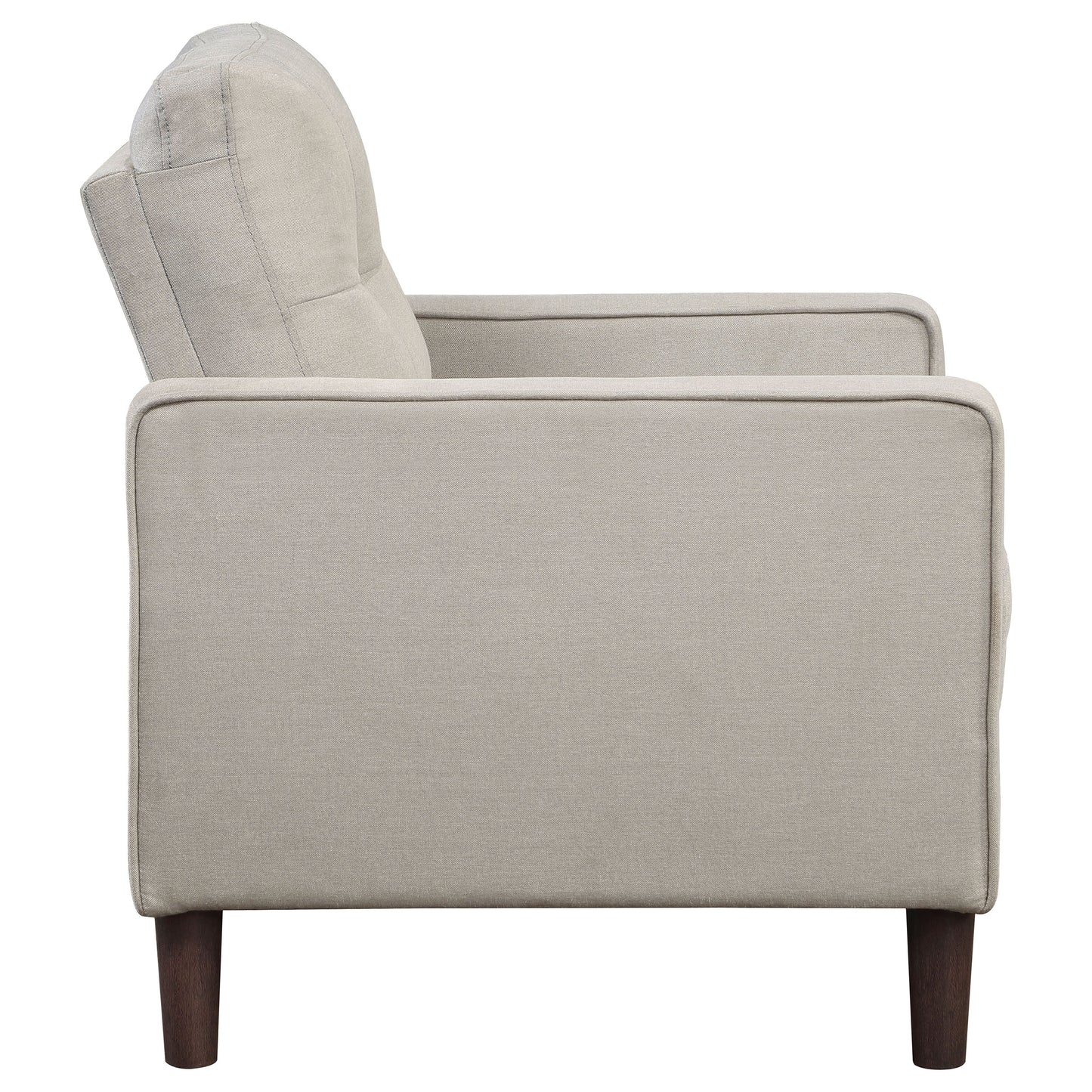 Sillón tapizado Bowen con brazos articulados y capitoné en color beige