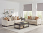 Loveseat tapizado con brazos inclinados Christine en beige